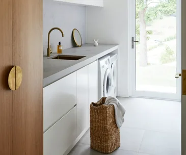 Contemporary laundry with wicker baskets