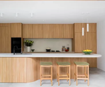 white vertical pendant lights in a contemporary mid-century home