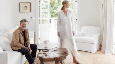 Tim Ross and Michelle Glew-Ross in their white living room in the Northern Rivers