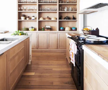Timber kitchen cabinetry with customer timber shelving and oven