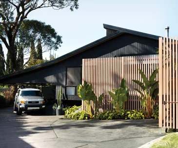 The black and timber facade of Shannon Vos' former family home