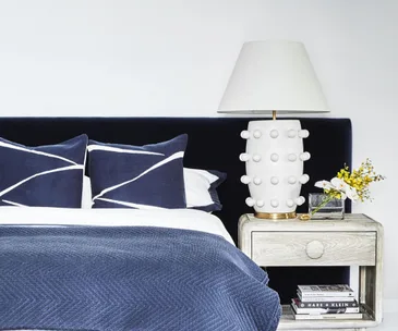 Upholstered bedhead in green velvet