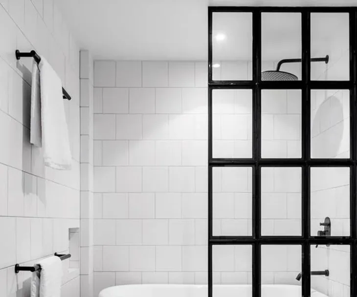 image of a contemporary, modern black and white bathroom to describe best shower heads
