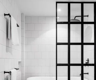 image of a contemporary, modern black and white bathroom to describe best shower heads