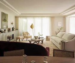 A contemporary living room with a white sofa