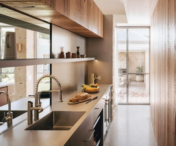 A butler's pantry with stainless steel finishes