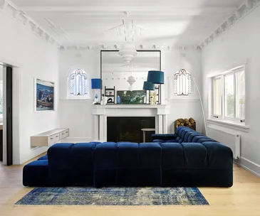 Navy blue sofa in heritage living room