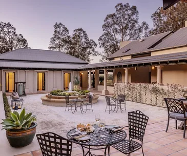 A Spanish mission-style courtyard and garden