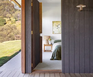 An alpine-style home in Brookfield, QLD, is deeply connected to its idyllic surrounds