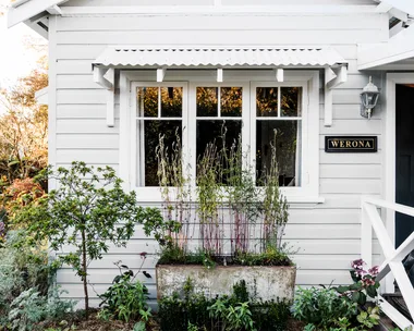 white weatherboard cottage facade exterior