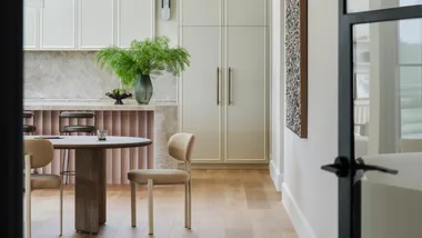 A contemporary kitchen and dining area